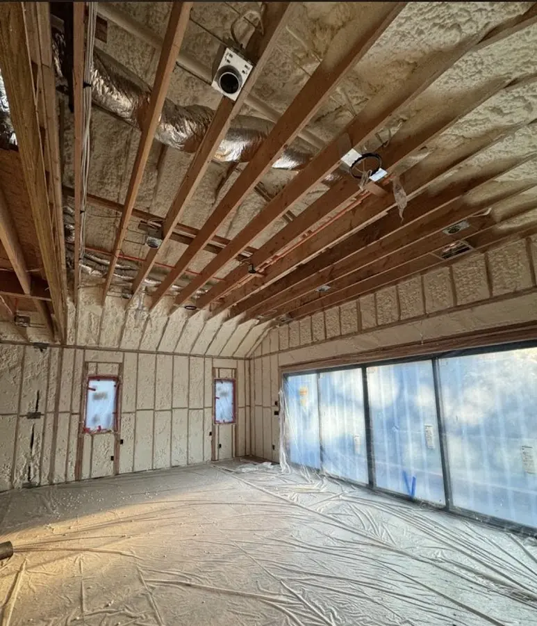 Interior walls and ceiling insulated with spray foam during new construction in Herculaneum
